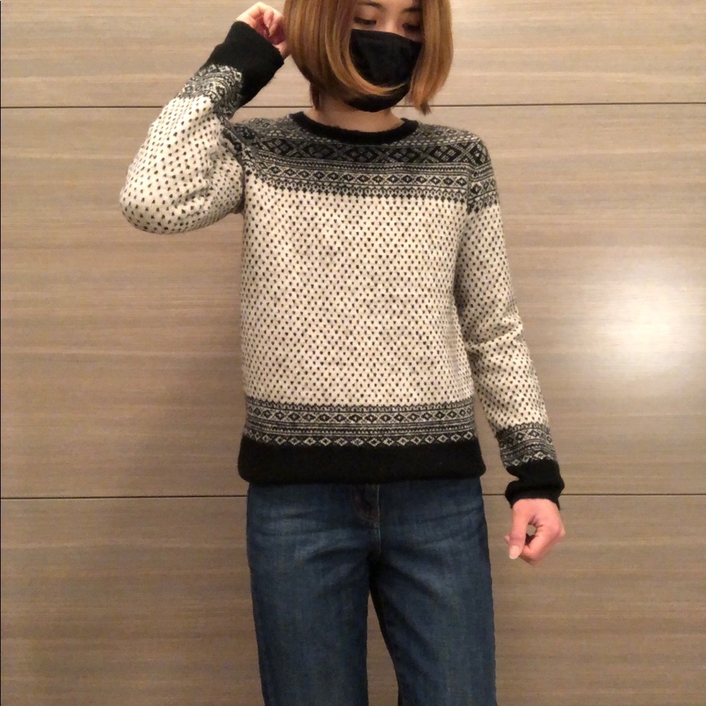 Uniqlo long sleeve black and white sweater.  Size small.